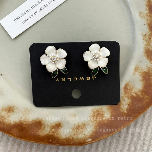 White Floral Stud Earrings